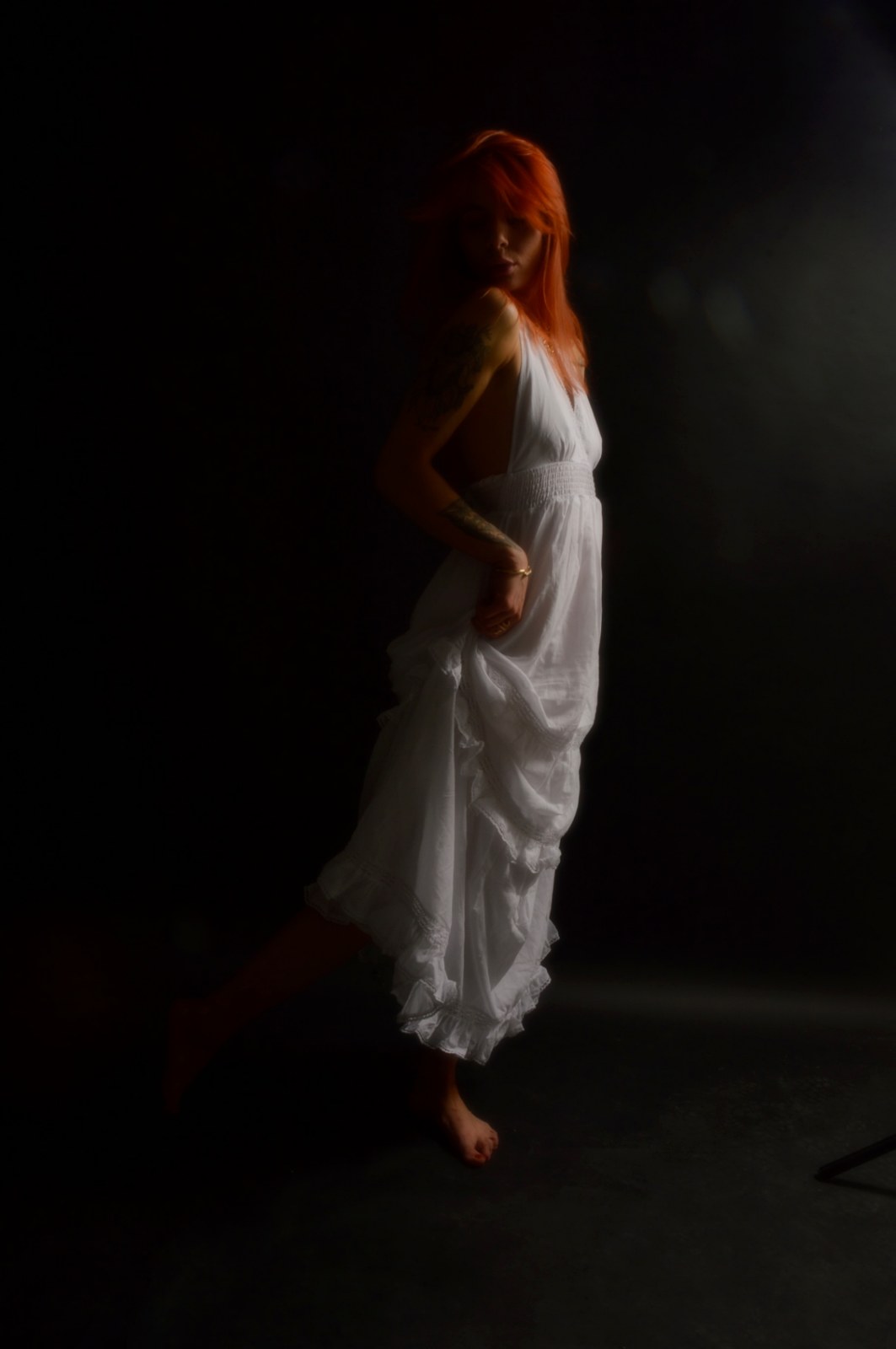 byliv in a flowing white dress